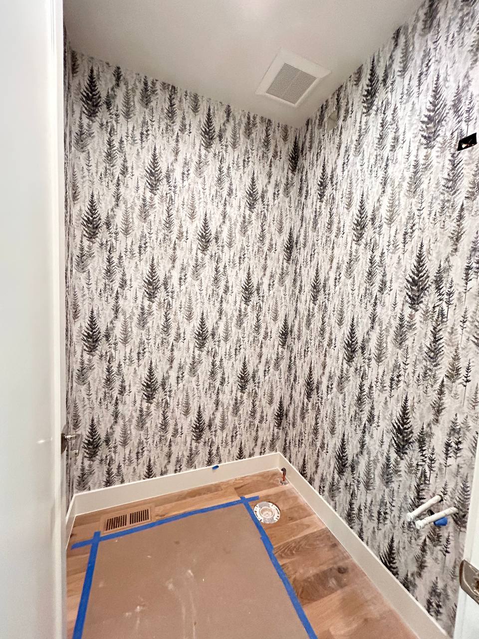 Minimalist textured wallpaper installed in home