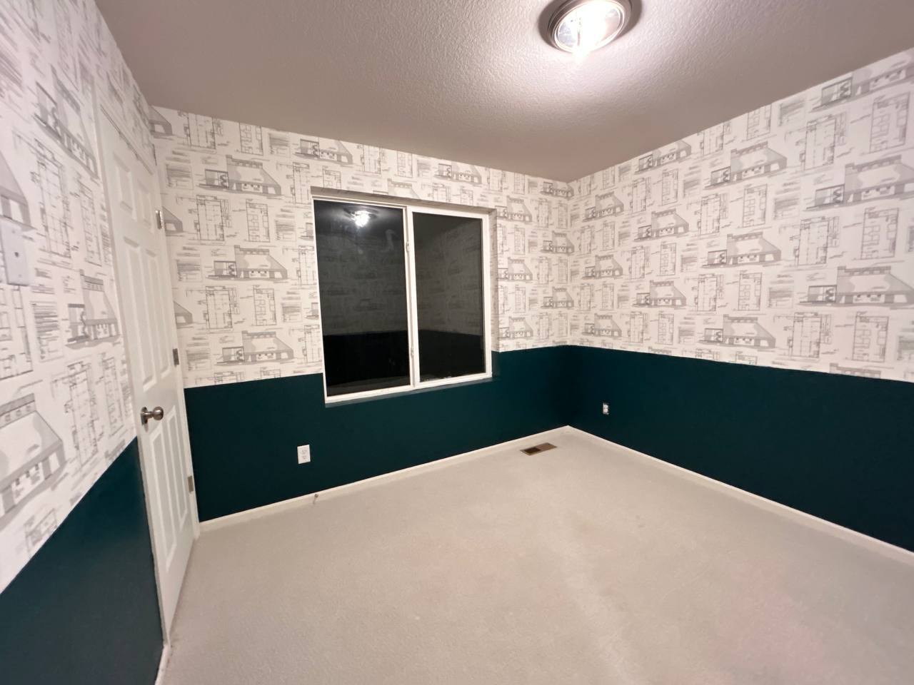 Geometric wallpaper applied on feature wall