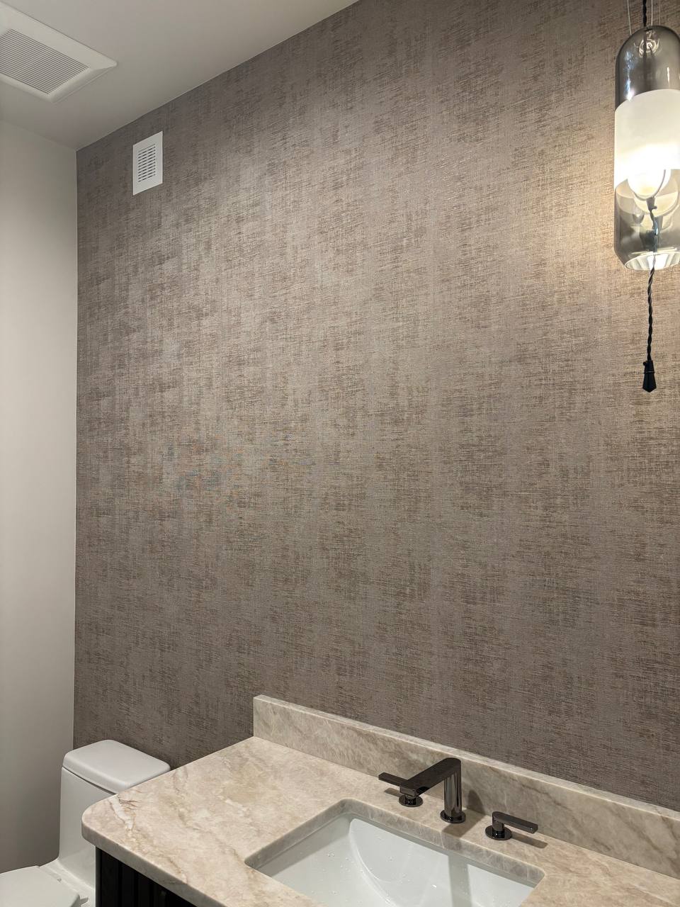 Detail shot of professional wallpaper alignment