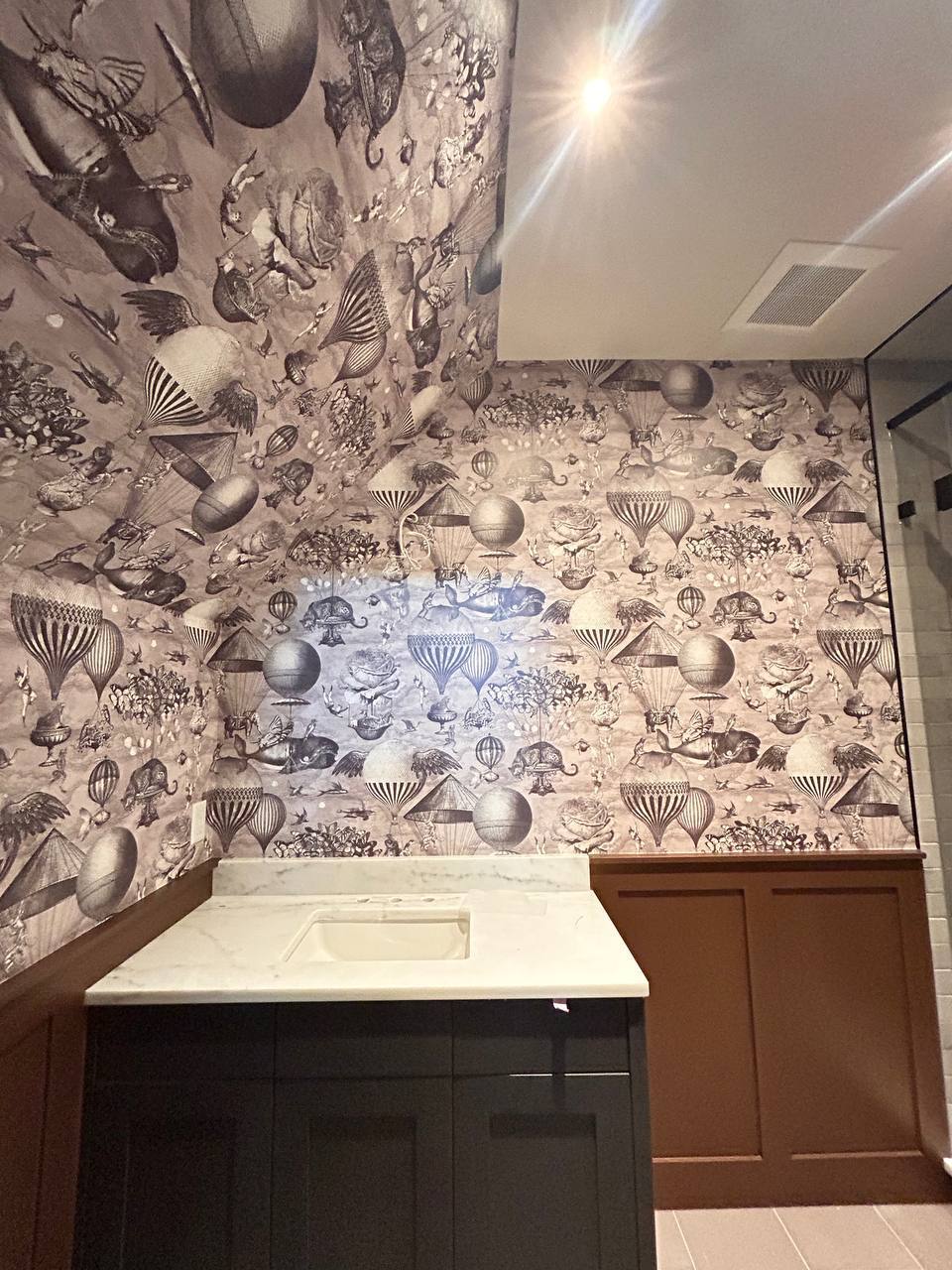 Modern wallpaper applied to feature wall in home