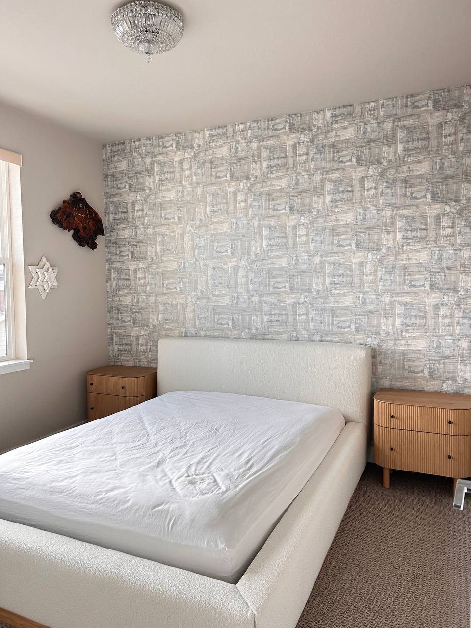 Accent wall with floral wallpaper applied by Colorado installers